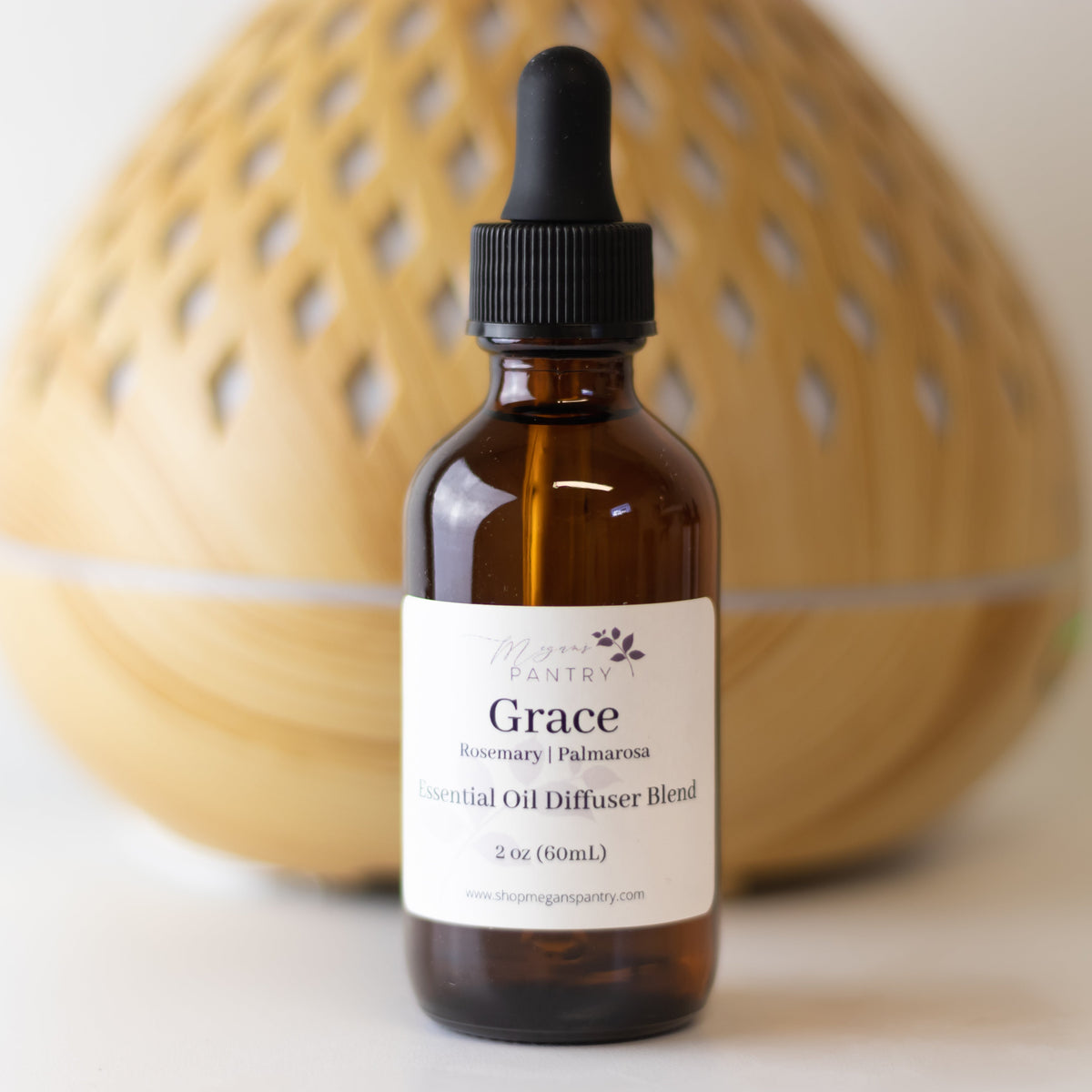 Megan's Pantry 2 oz signature essential oil diffuser blend bottles with lavender, eucalyptus, citrus, rosemary, and palmarosa options