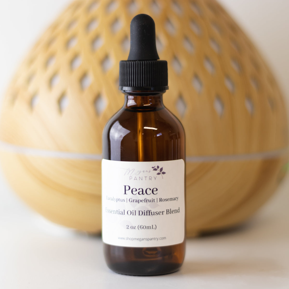 Megan's Pantry 2 oz signature essential oil diffuser blend bottles with lavender, eucalyptus, citrus, rosemary, and palmarosa options