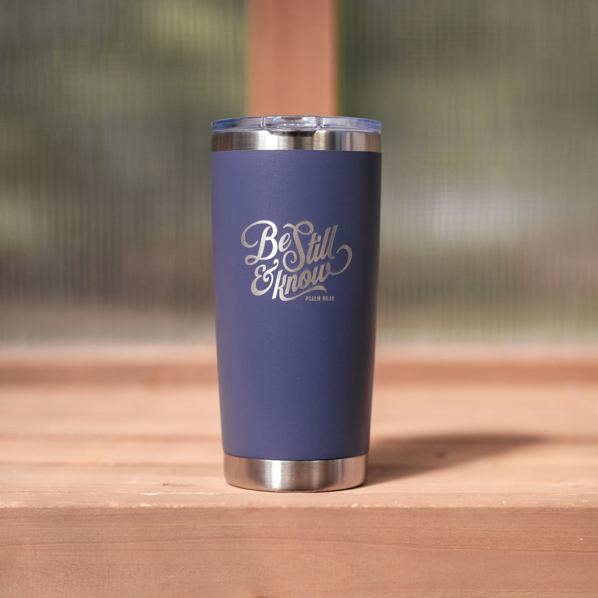 Plum stainless steel travel mug from Megan's Pantry engraved with "Be still and know" and Psalm 46:10.