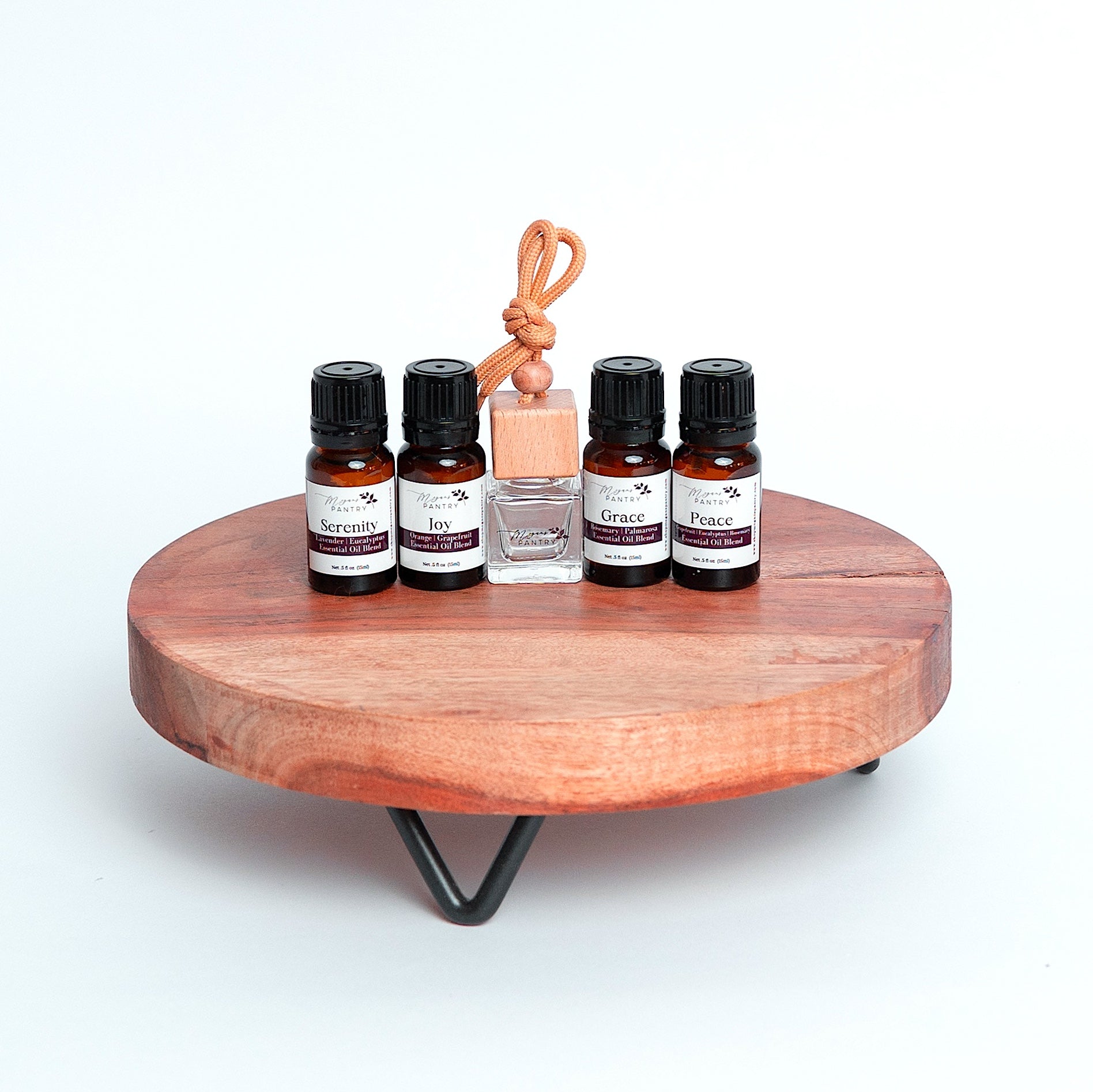 The Drive &amp; Diffuse Set was designed for those looking to replace synthetic fragrances with a non-toxic, aromatherapy-based alternative. This set pairs our wood hanging car diffuser with our Signature Essential Oil Blends, making it simple to bring natural scent into your daily routine.

Whether in your car, closet, or workspace, this set transforms everyday spaces into a place of calm, focus, and balance.