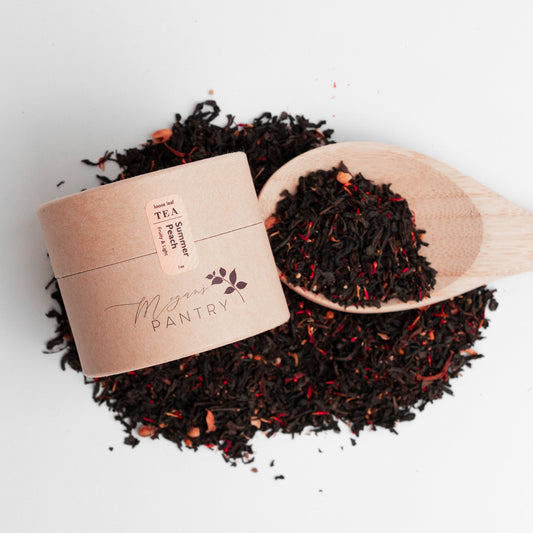 Megan’s Pantry Summer Peach Black Tea – a fruity blend of black tea, peach, and passionfruit, perfect for refreshing iced or hot tea moments