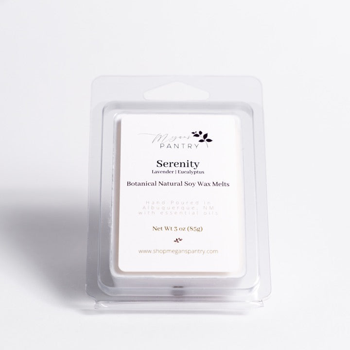 Hand-poured soy wax melts from Megan’s Pantry in recyclable containers, featuring six essential oil-infused fragrance options; clean, luxury aromatherapy for the home.