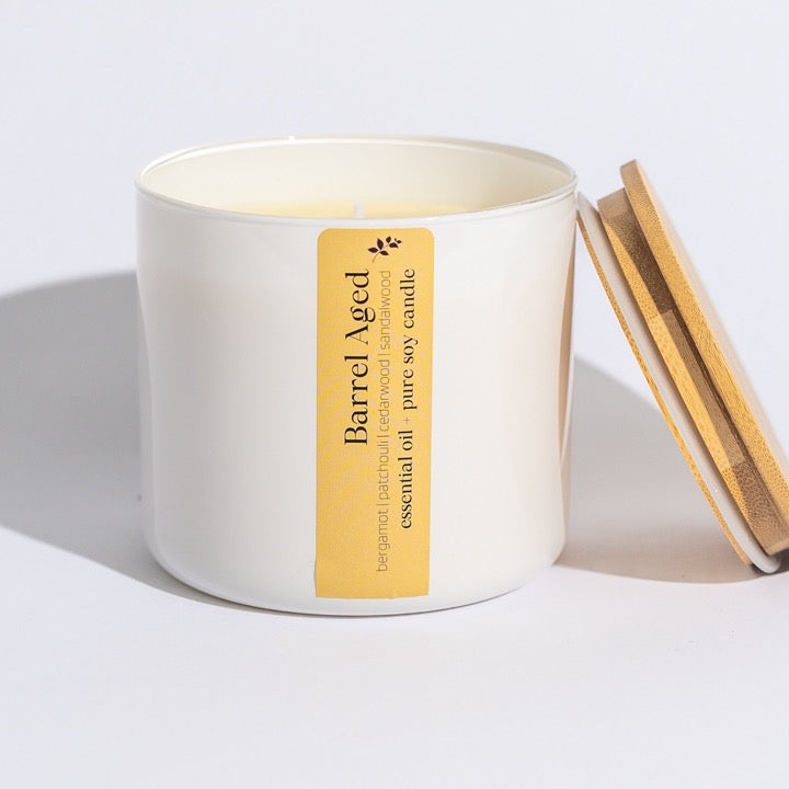 Our decadent Aromatherapy Essential Oil Candles are hand-poured using the purest soy wax, pure cotton wicks, and our signature essential oil blend that is crafted in-house in small batches.
Barrel Aged is a blend of patchouli, bergamot, cedarwood, and sandalwood essential oils, creating a golden, musky aroma. Like enjoying an old scotch with a great friend in a mood-lit room.