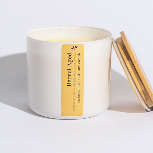 Our decadent Aromatherapy Essential Oil Candles are hand-poured using the purest soy wax, pure cotton wicks, and our signature essential oil blend that is crafted in-house in small batches.
Barrel Aged is a blend of patchouli, bergamot, cedarwood, and sandalwood essential oils, creating a golden, musky aroma. Like enjoying an old scotch with a great friend in a mood-lit room.