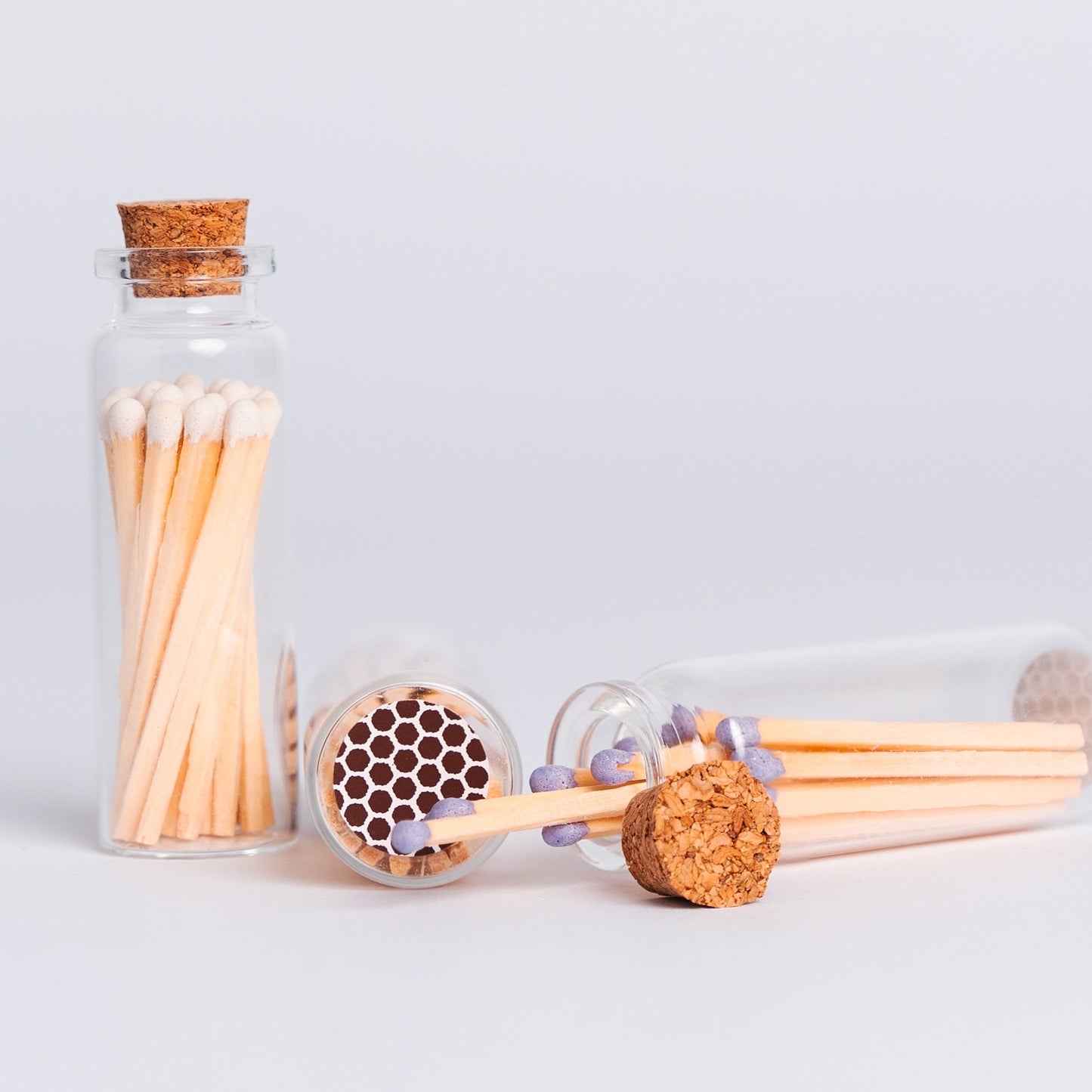 These lovely match sets are the perfect addition to your favorite candle or candle gift.
Each glass vial contains 20 single-use colored wooden safety matches and a round piece of striker paper on the bottom. 100% free of Sulphur and toxic heavy metals.